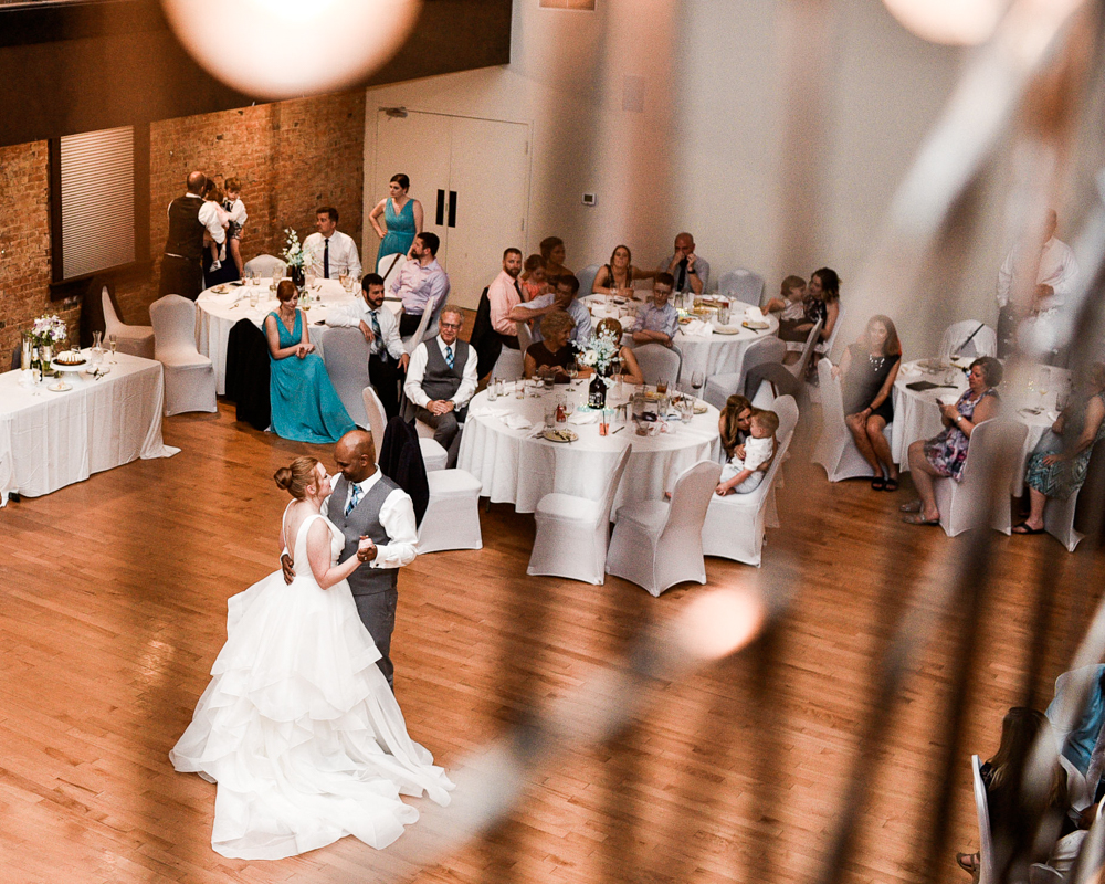 Newlywed couple dancing for the first time at St. Joseph Hall