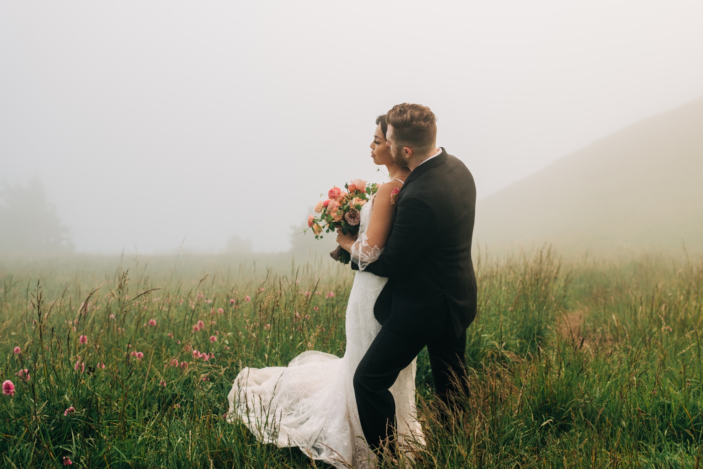 Couple embracing in the fog