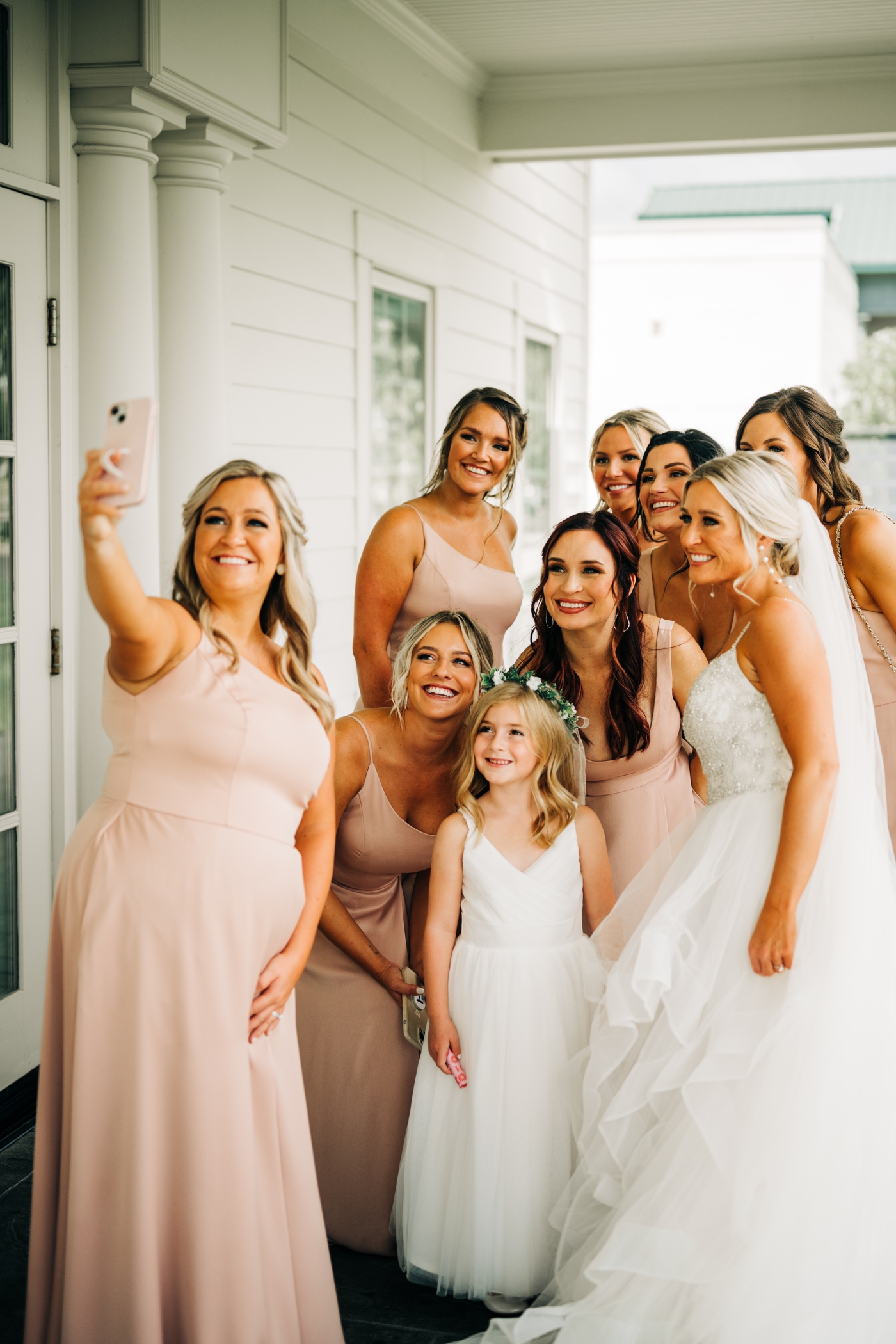 First look with bridesmaids at Hyatt Place