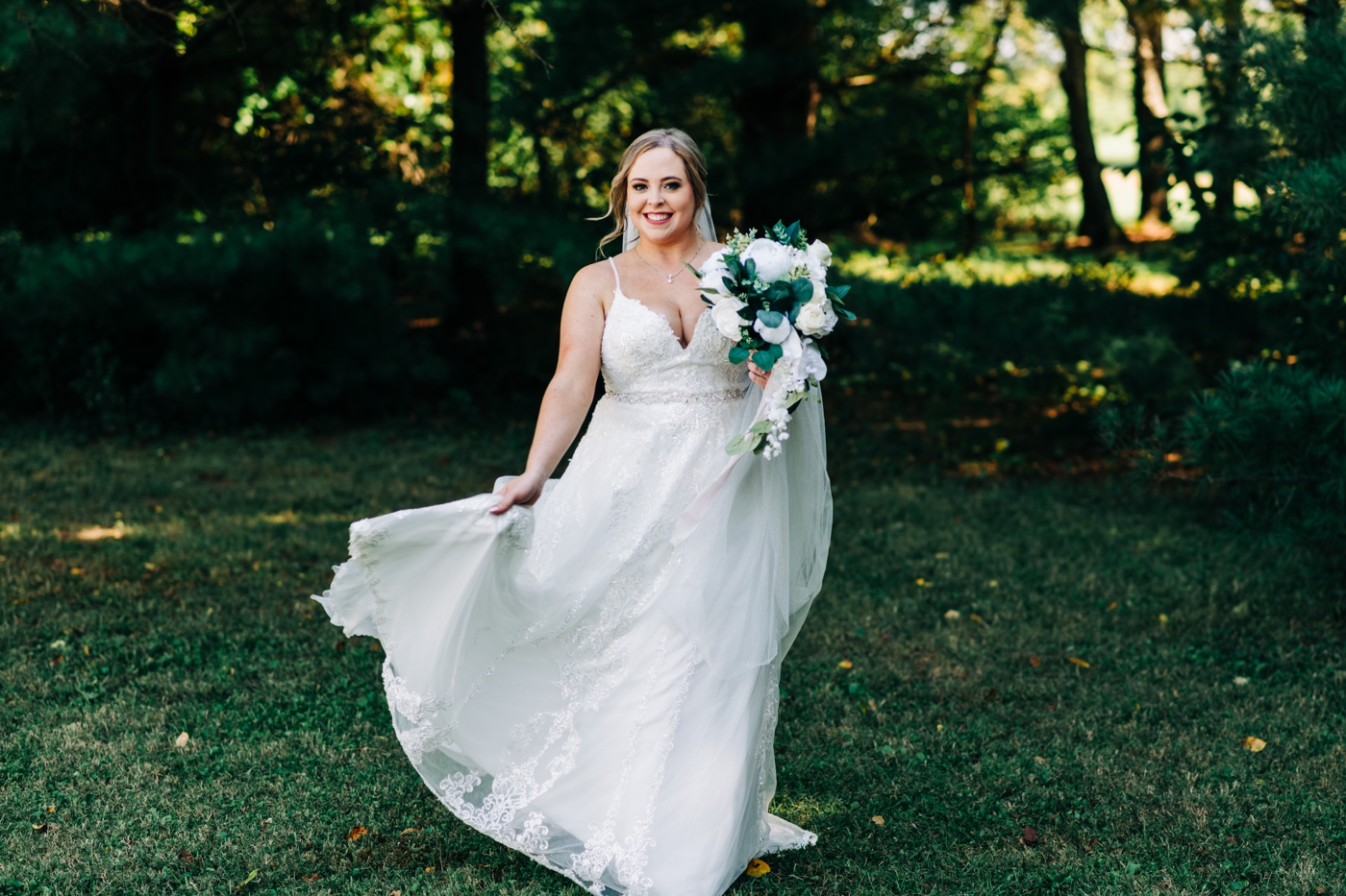Bridal portrait with bride waring a-line gown for backyard wedding