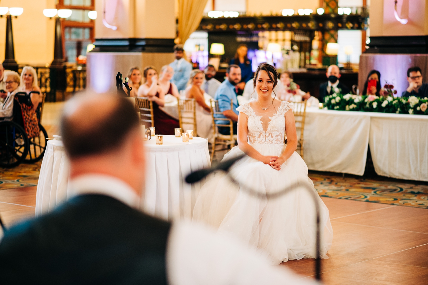 Groom serenading bride during wedding reception at Union Station