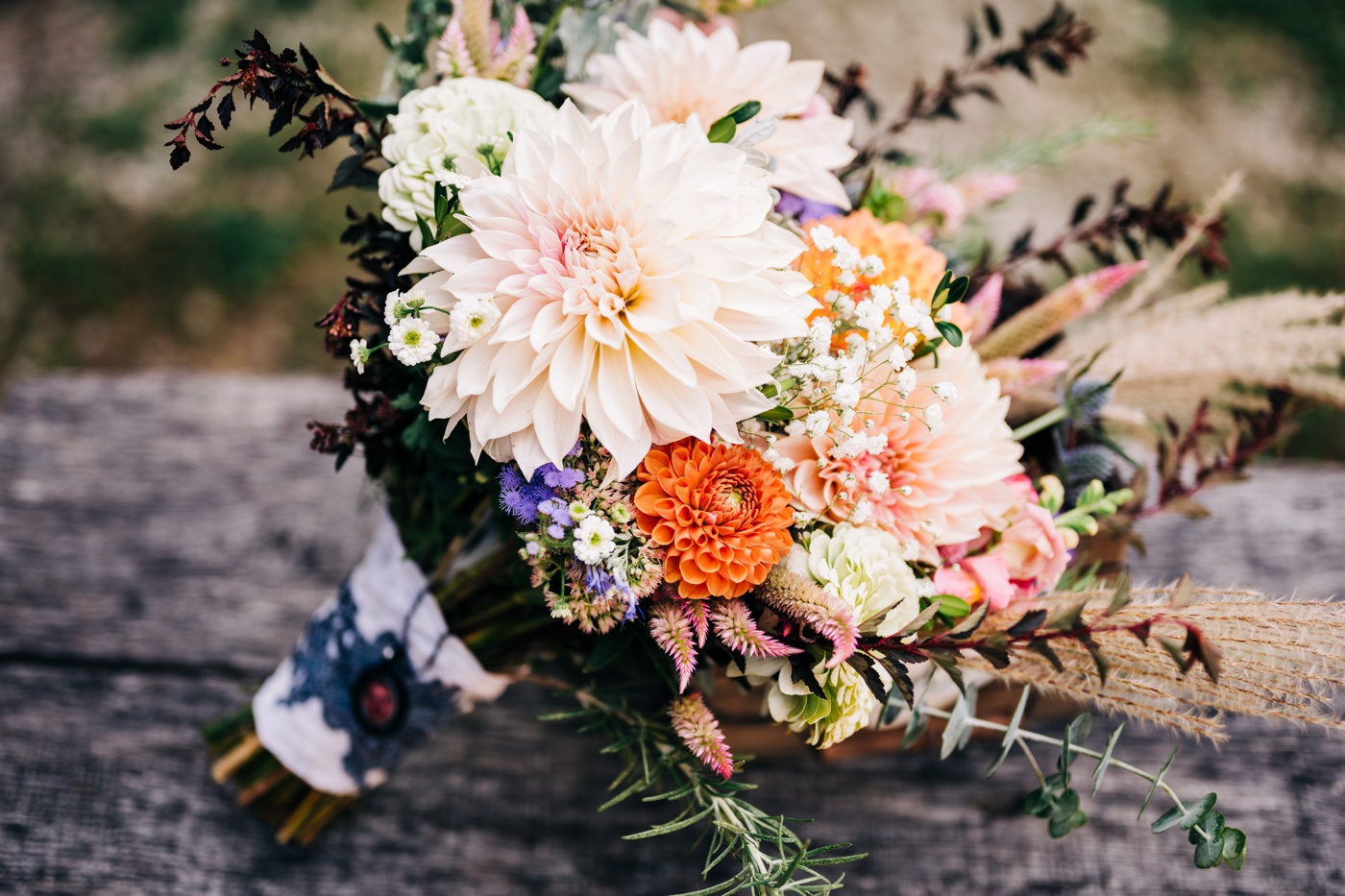 handtied bridal bouquet with pink and orange flowers