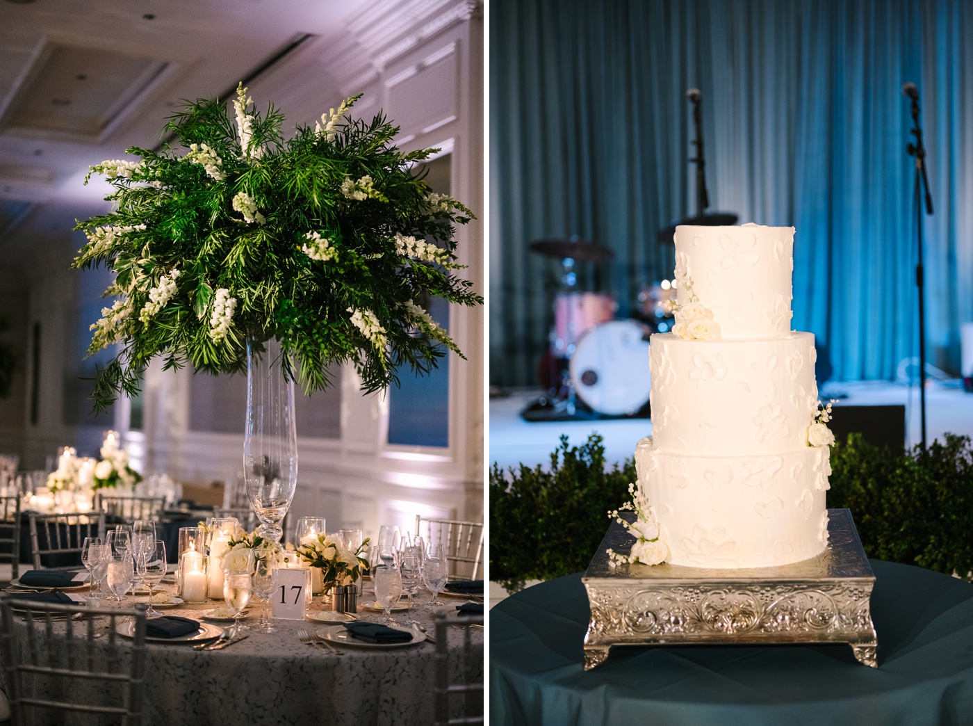 Tall wedding centerpiece filled with greenery and white delphinium
