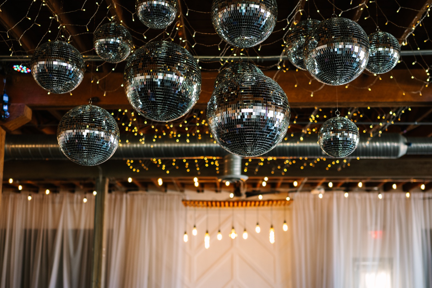 Disco balls on the ceiling of an Indianapolis wedding reception