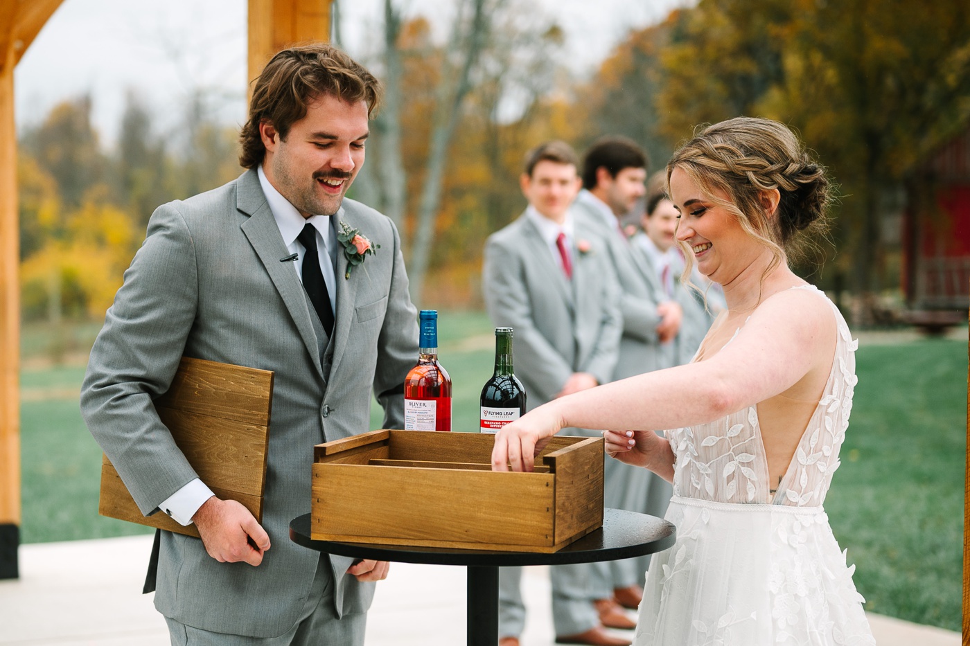 Bride and groom doing a wine box wedding ceremony 