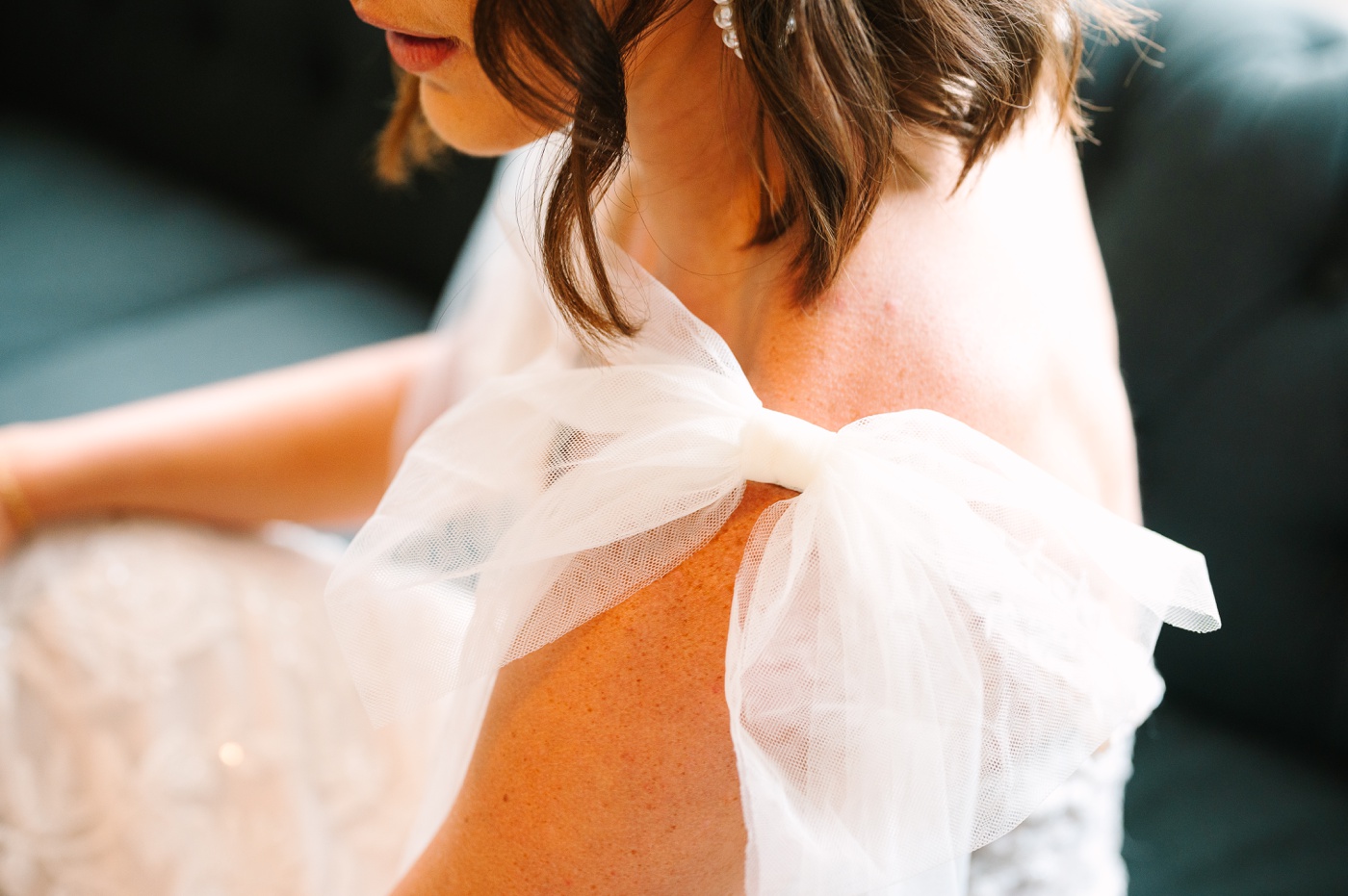 Tulle bow sleeves on a wedding dress from Gretchen's Bridal Gallery