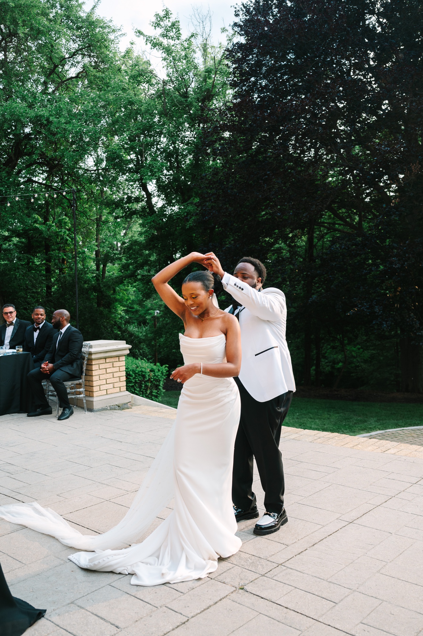 Bride and groom dancing on the patio at Laurel Hall